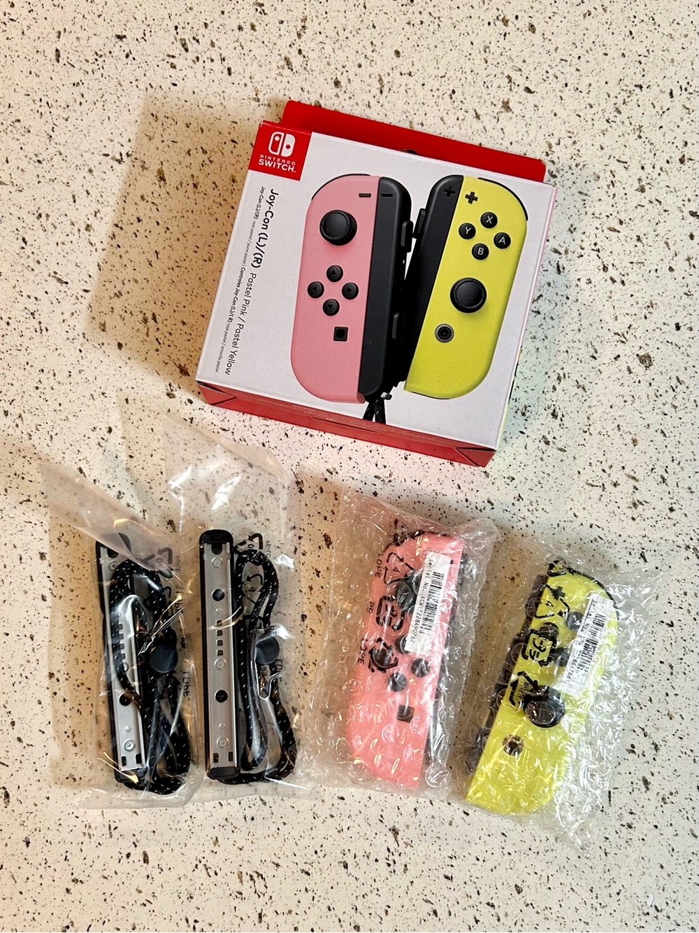 Nintendo Switch Pastel Pink and Pastel Yellow Joycons
